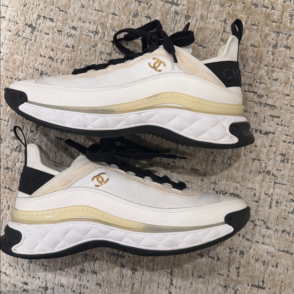 Designer White and Black Platform Sneakers with Gold Accent - Picture 3 of 3